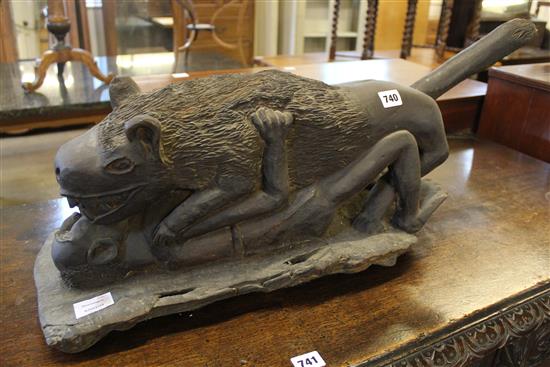 Zambian carving of a lion attacking a figure